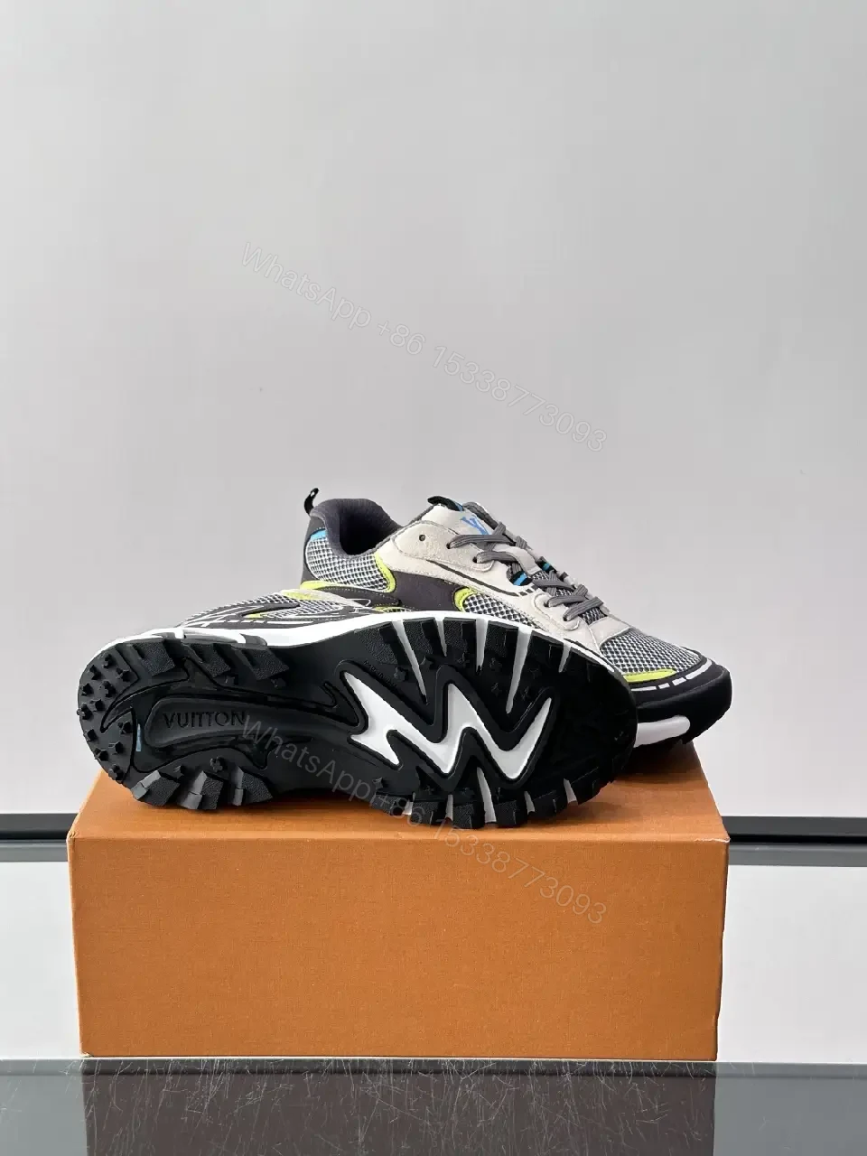 View 3 of Gray/Black Mesh Leather Sneaker with LV Accents, Sporty Chunky Style