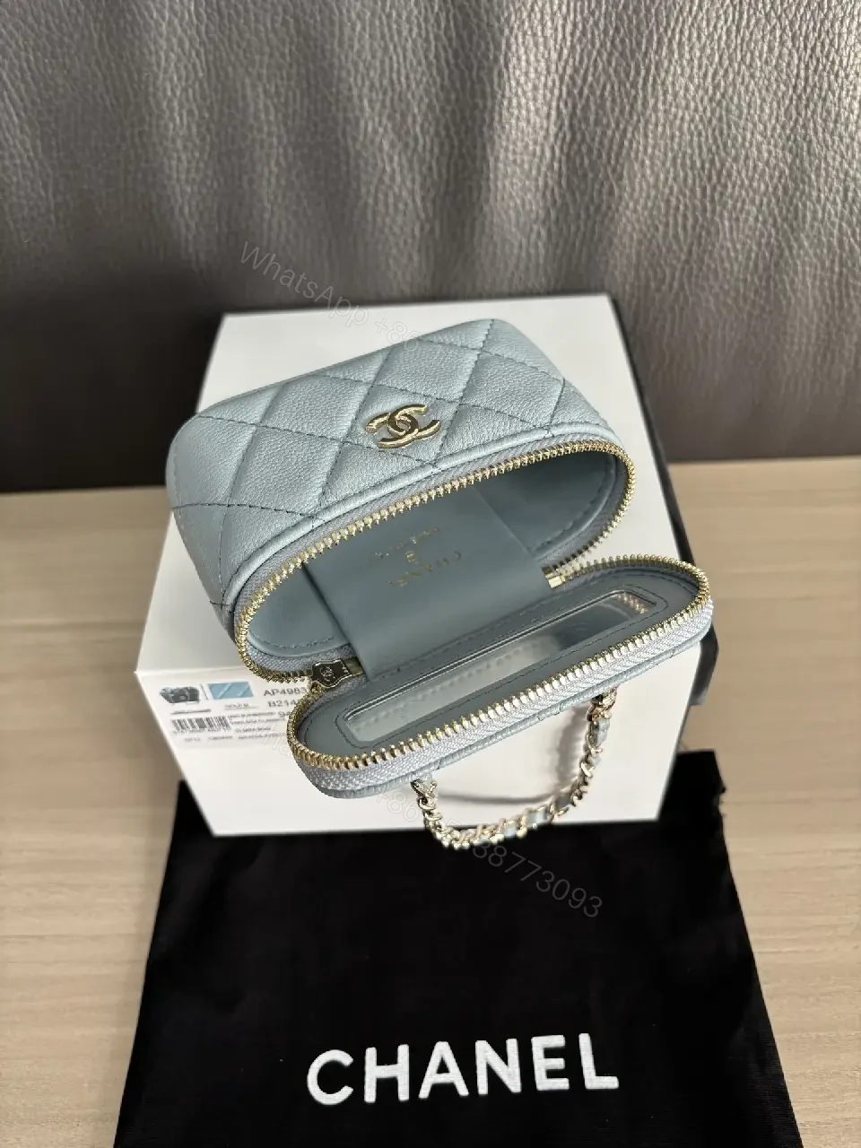 View 2 of Blue-Gray Quilted Leather Shoulder Bag with Chain Strap, Compact Luxury