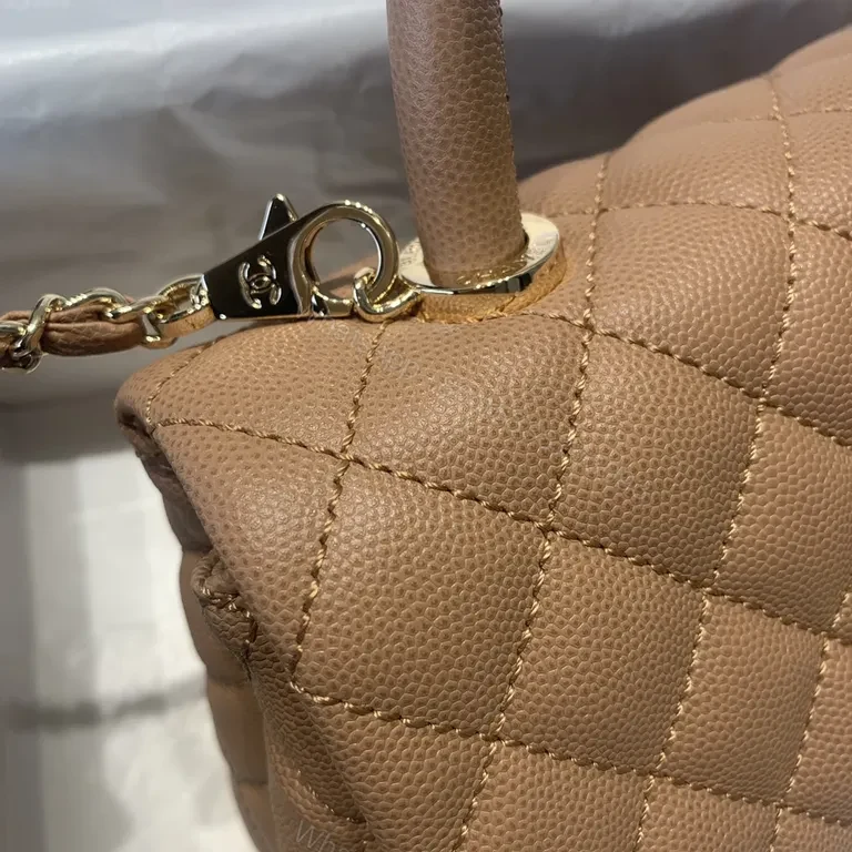 View 4 of Chic Quilted Tan Leather Handbag with Chain Accent