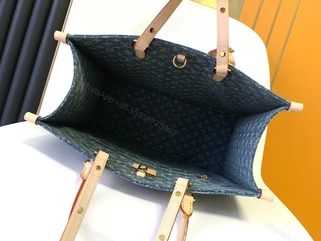 View 2 of Denim Monogram Tote: Premium Denim Leather-Trim Tote with Signature Details