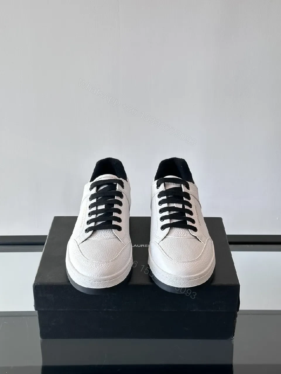 View 5 of White Leather Sneaker with Black Accents — Minimalist Luxury Sneaker