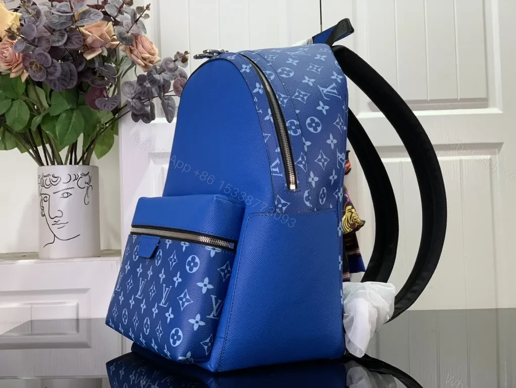 View 3 of Blue Monogram Luxe Backpack: Compact, Durable, Designer-Inspired