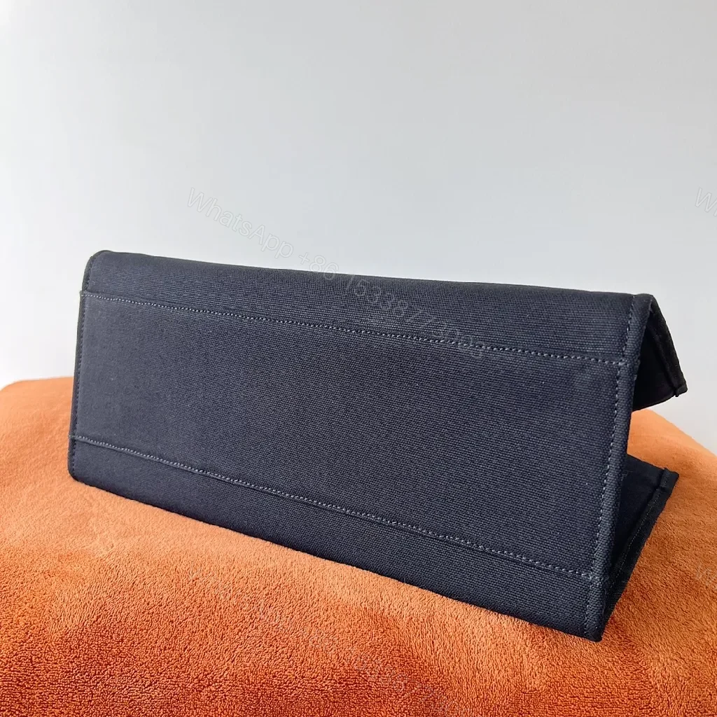 View 6 of Structured Sophistication Tote: Black, Matte Shell, Modern Luxury, Gold Hardware