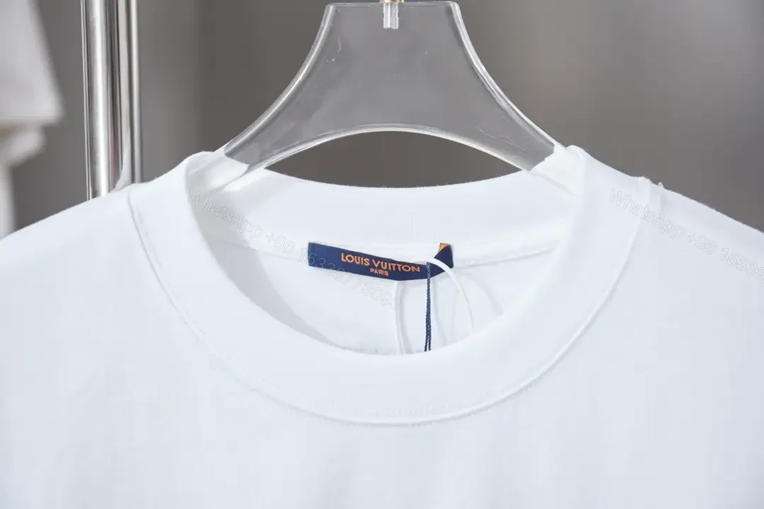 View 2 of Minimalist Luxe Tee with Subtle Crest – White Cotton Tee