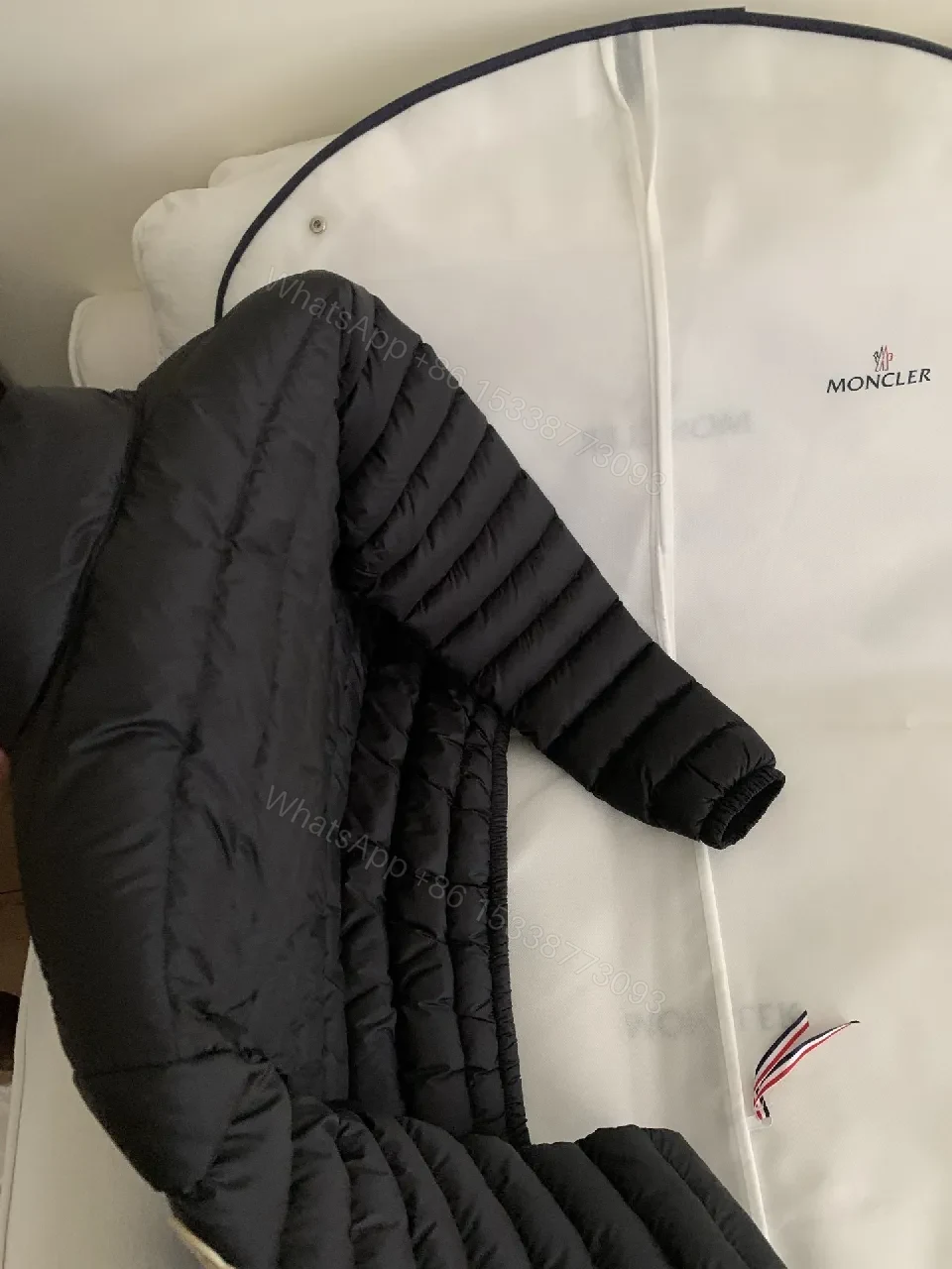View 4 of Black Nylon Puffer Jacket: Sleek, Insulated Warmth with Patch
