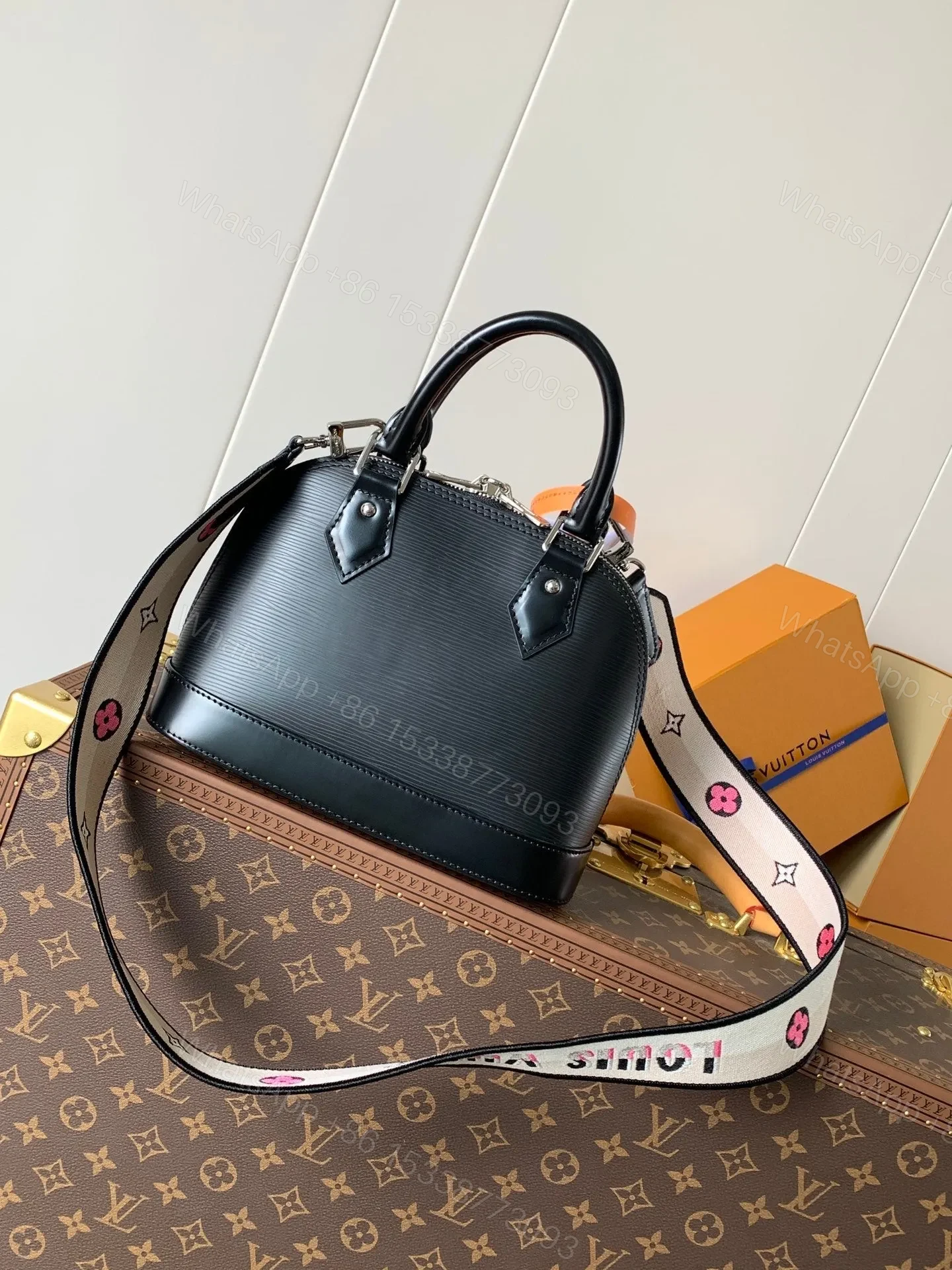 View 2 of LV ALMA BB BAG 23 IN BLACK GRAIN COWHIDE