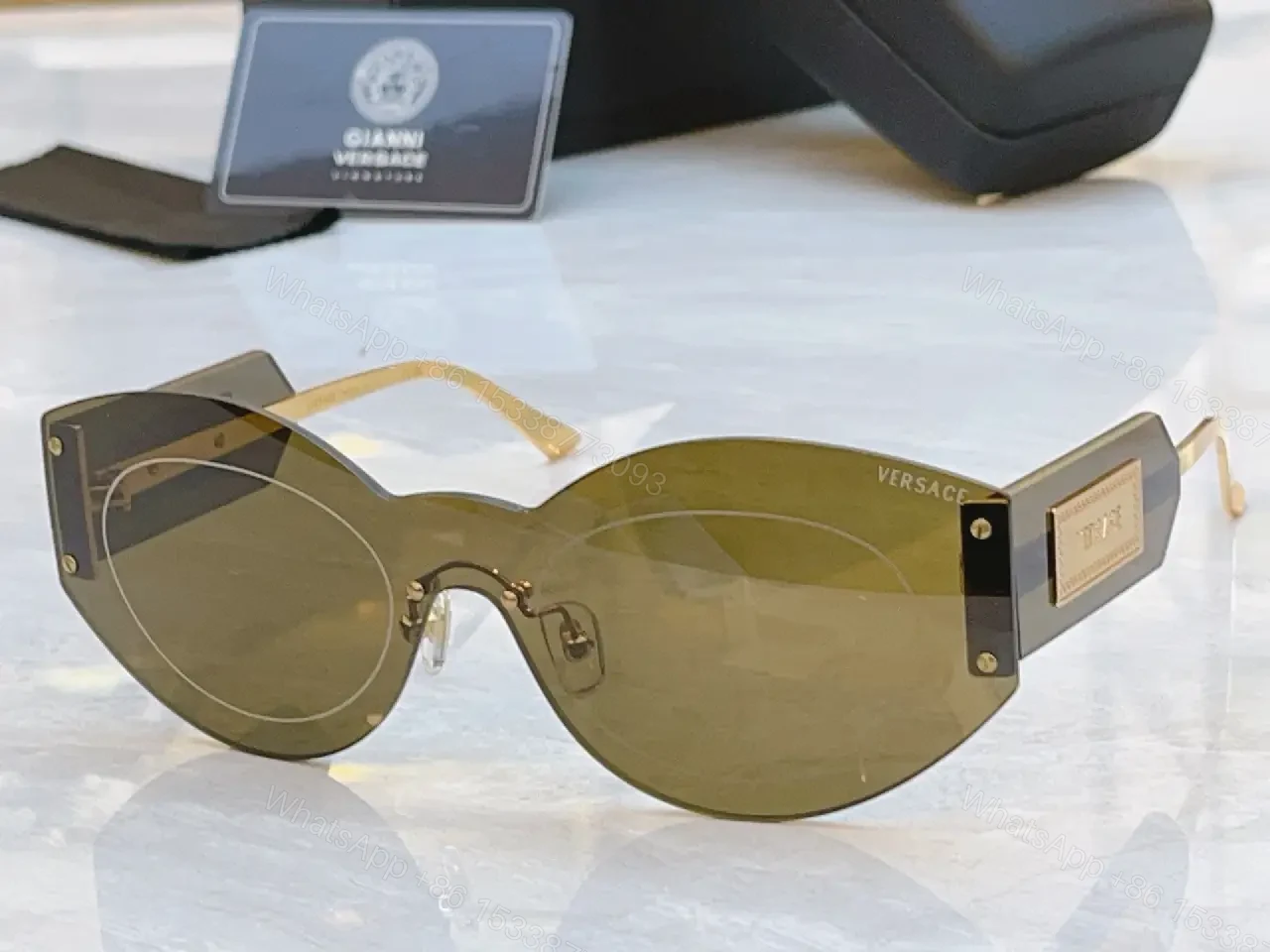 View 7 of Sculpted Round Sunglasses: Bold Hardware Luxe Eyewear