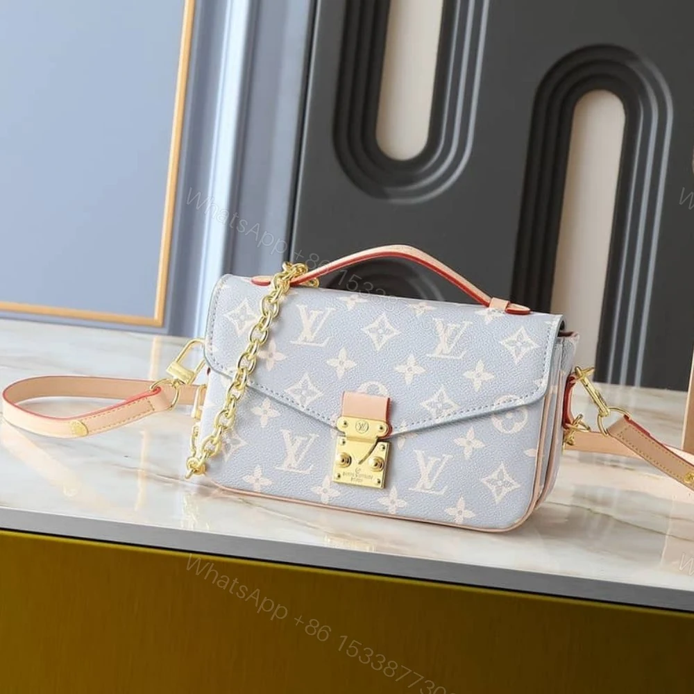 View 2 of Louis Vuitton Pochette Métis East West Coated Canvas Trianon 21Cm M12429