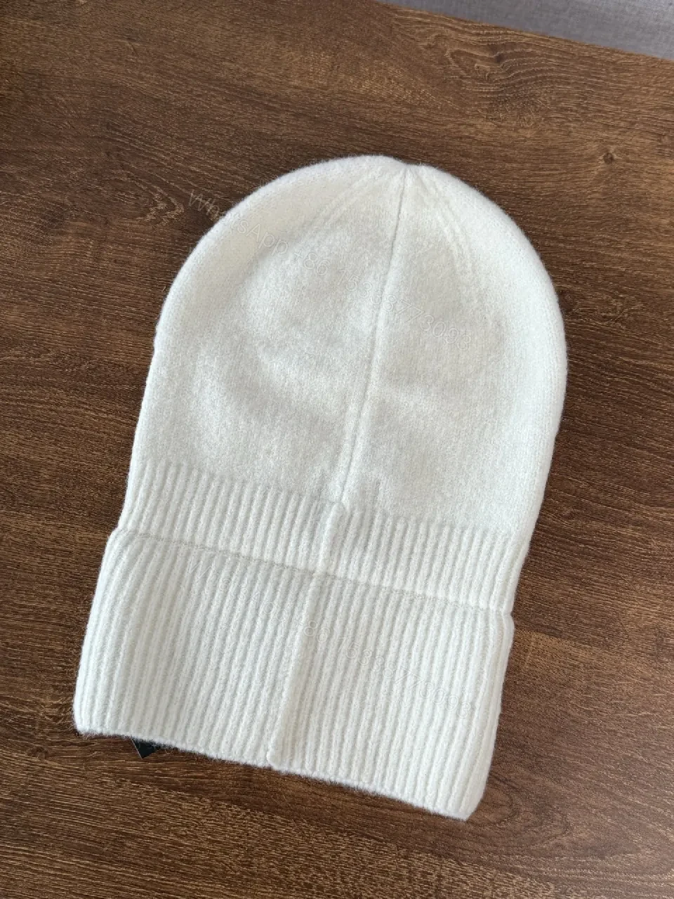 View 6 of Chic Minimalism Beanie: Off-White Knit, Embroidered Logo, Everyday Luxury