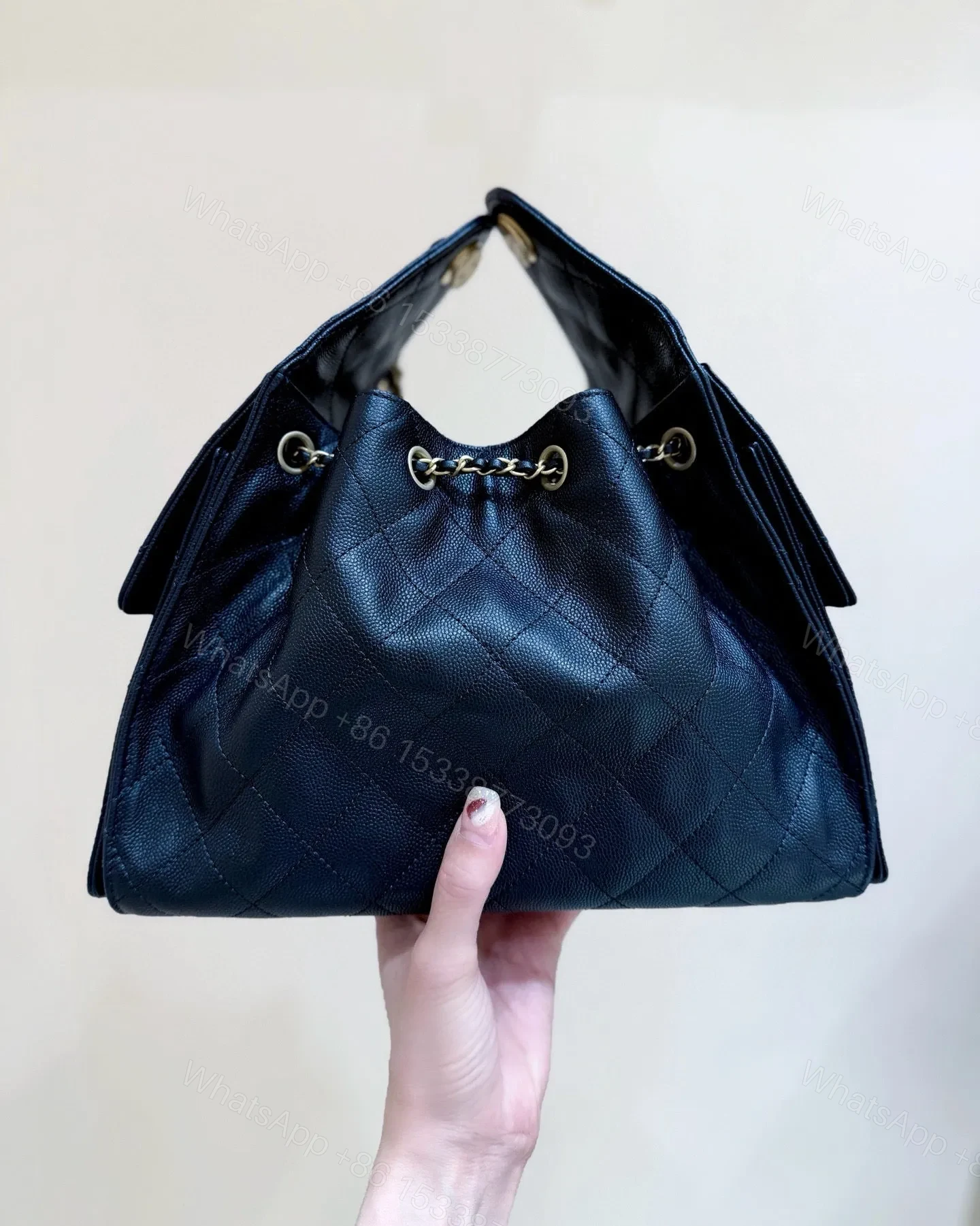 View 5 of CHANEL 25 HANDBAG IN BLACK 30 GRAINED CALFSKIN GOLD HARDWARE