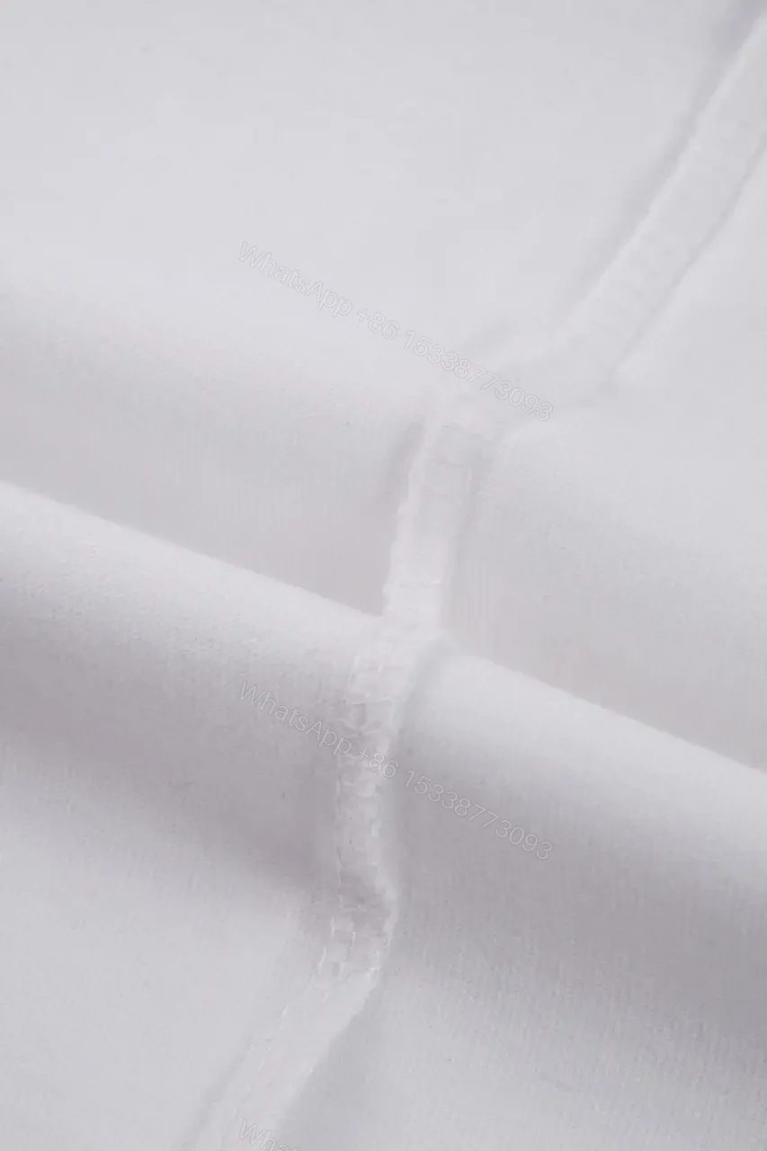 View 6 of Minimalist Luxe Tee: White Cotton, Delicate Embroidery, Everyday Chic