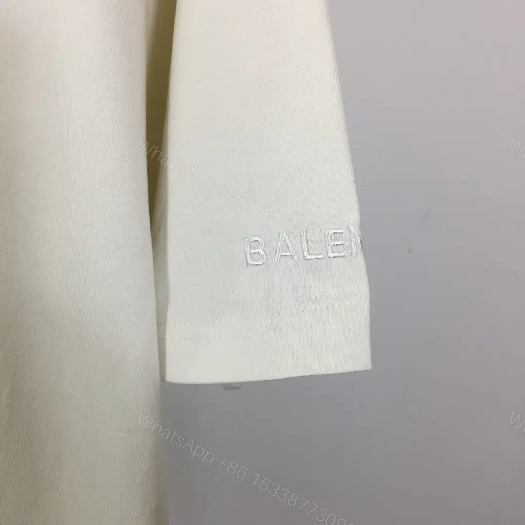 View 4 of Off-White Star-Accented Relaxed Cotton Tee