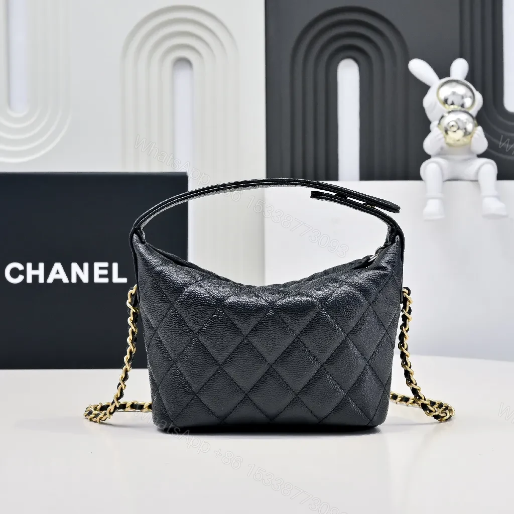 View 2 of Compact Black Quilted Mini Bag with Gold Hardware, Crossbody Style