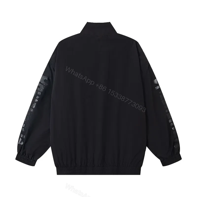 View 3 of Minimalist Black Windbreaker: Subtle Branding, All-Season Outerwear