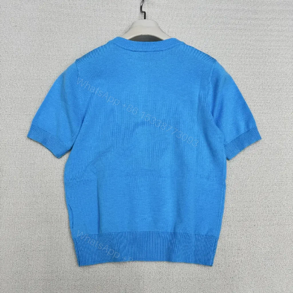 View 6 of Mineral Blue Knit Top with Crest – Elevated Weekend Layer, Mid-Weight