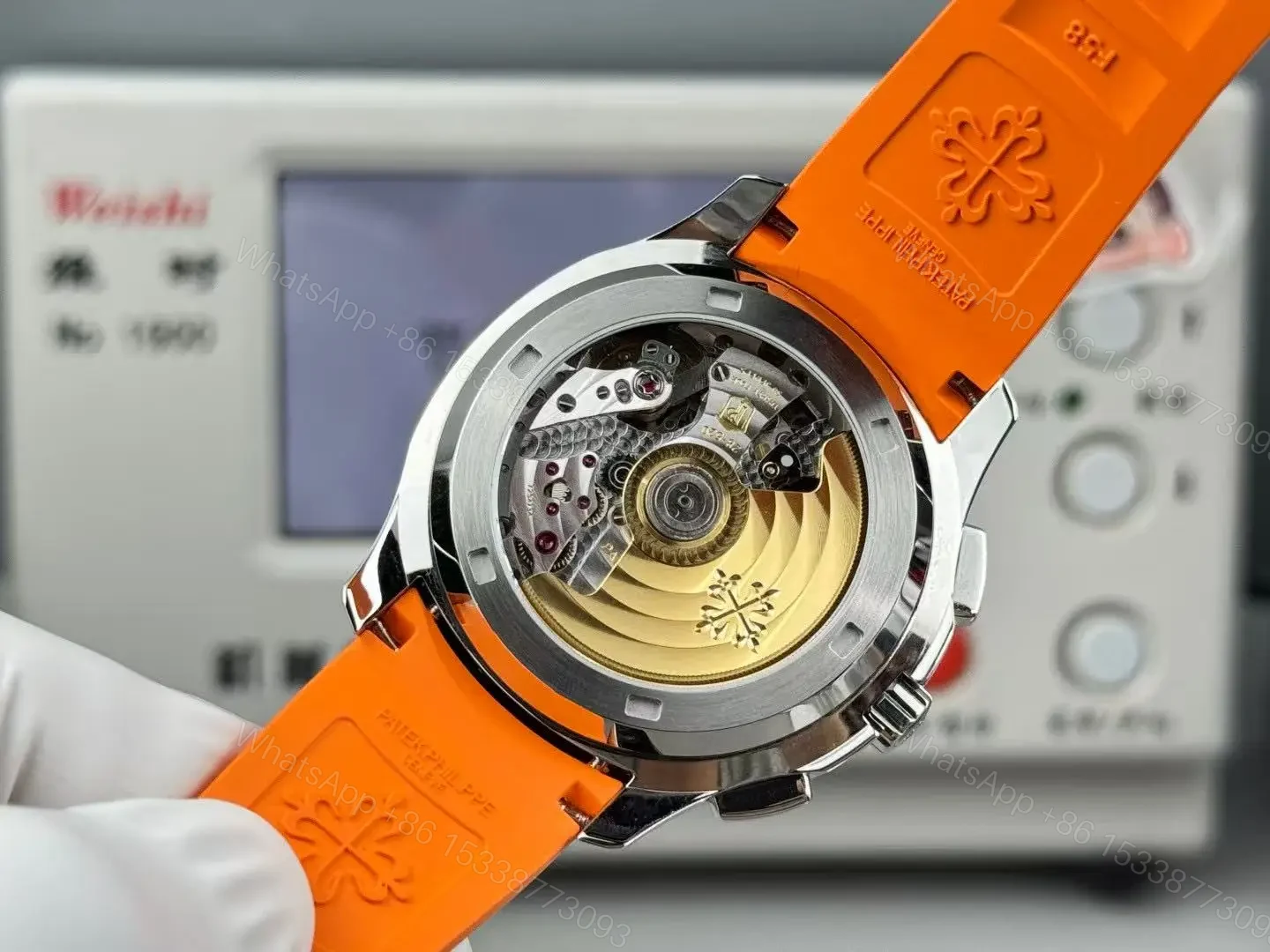 View 7 of Patek Philippe super clone Aquanaut Black Dial Orange Rubber Strap Premium 42MM PATEK-AQUA42-BLK-ORG