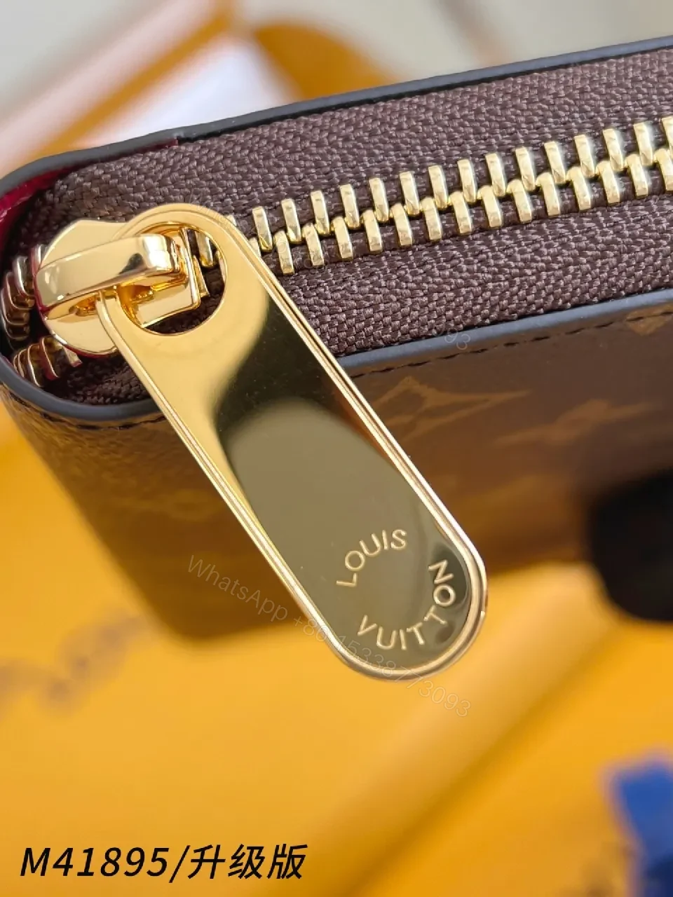 View 2 of Compact Monogram Leather Wallet: Signature Texture, Gold Zipper
