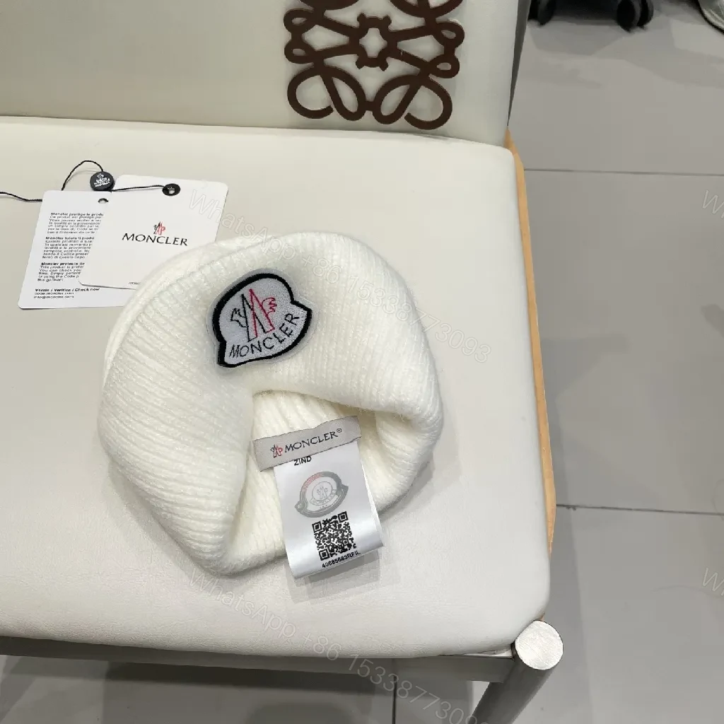 View 2 of White Knit Beanie: Ribbed Luxury, Crest Patch, All-Season