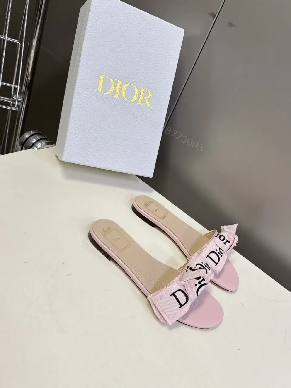 View 3 of Pink Satin Dior-Logo Bow Slip-Ons