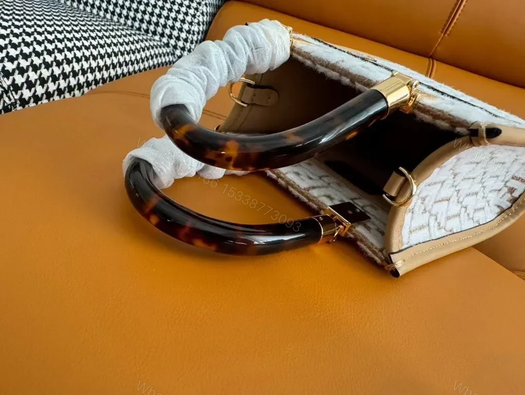 View 7 of Fendi Forma Mini Bag: Monogram Texture, Gold Accents, Crossbody Carry