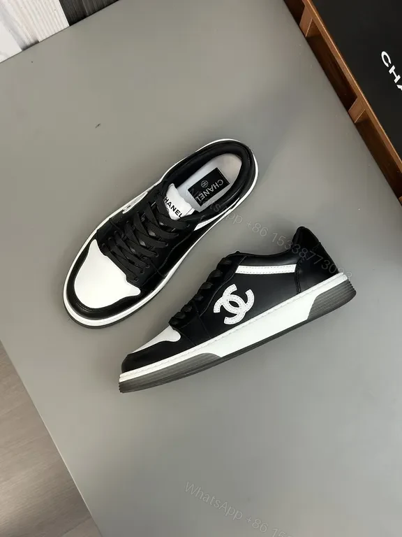View 5 of Monochrome Chanel-Style Low-Top Sneakers with Signature Emblem