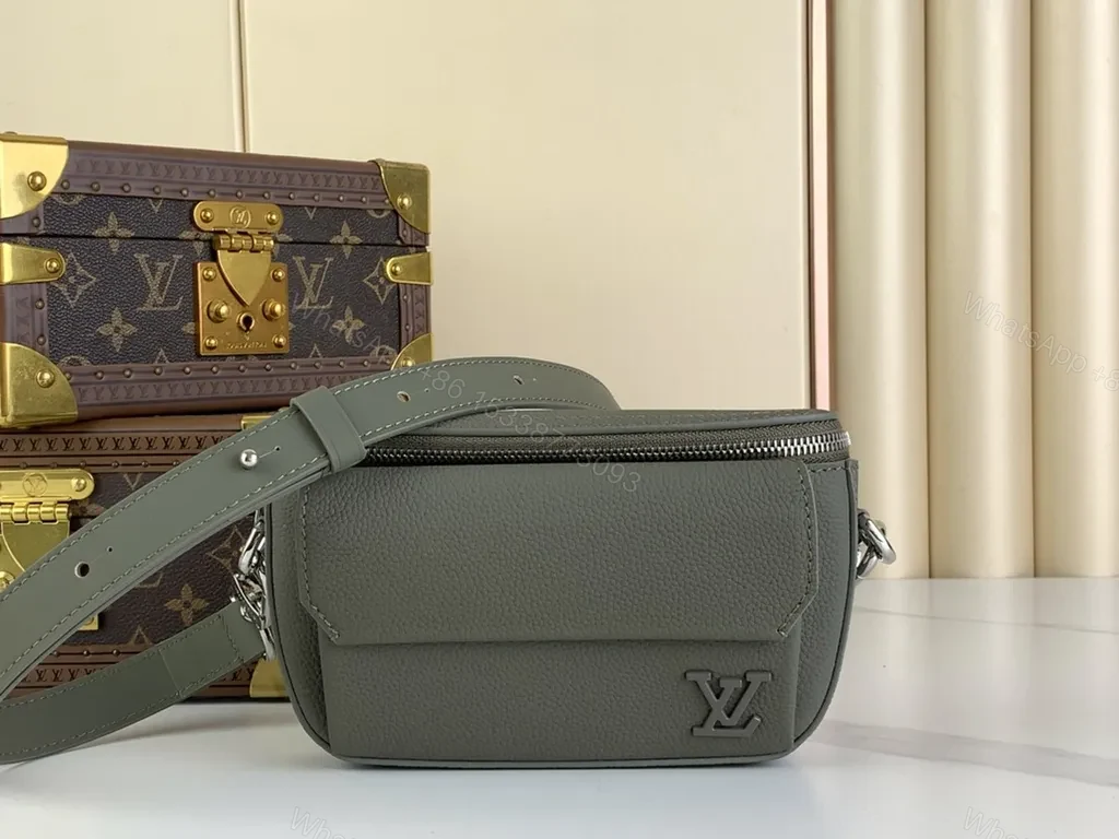 Quiet Luxe Compact Crossbody: Pebbled Leather, LV Logo, Gold Hardware — view 1