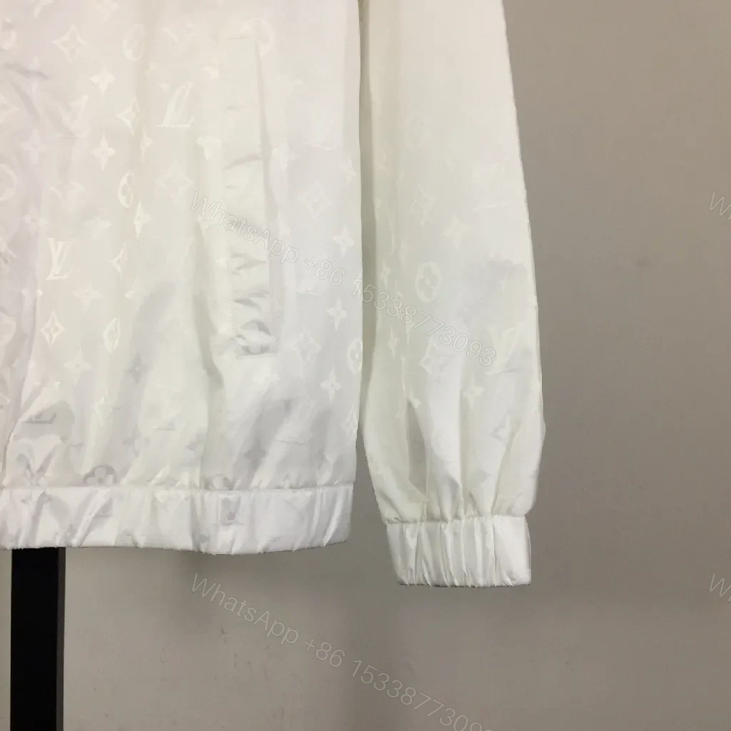 View 4 of White Zip-Front Jacket with Subtle Monogram Texture
