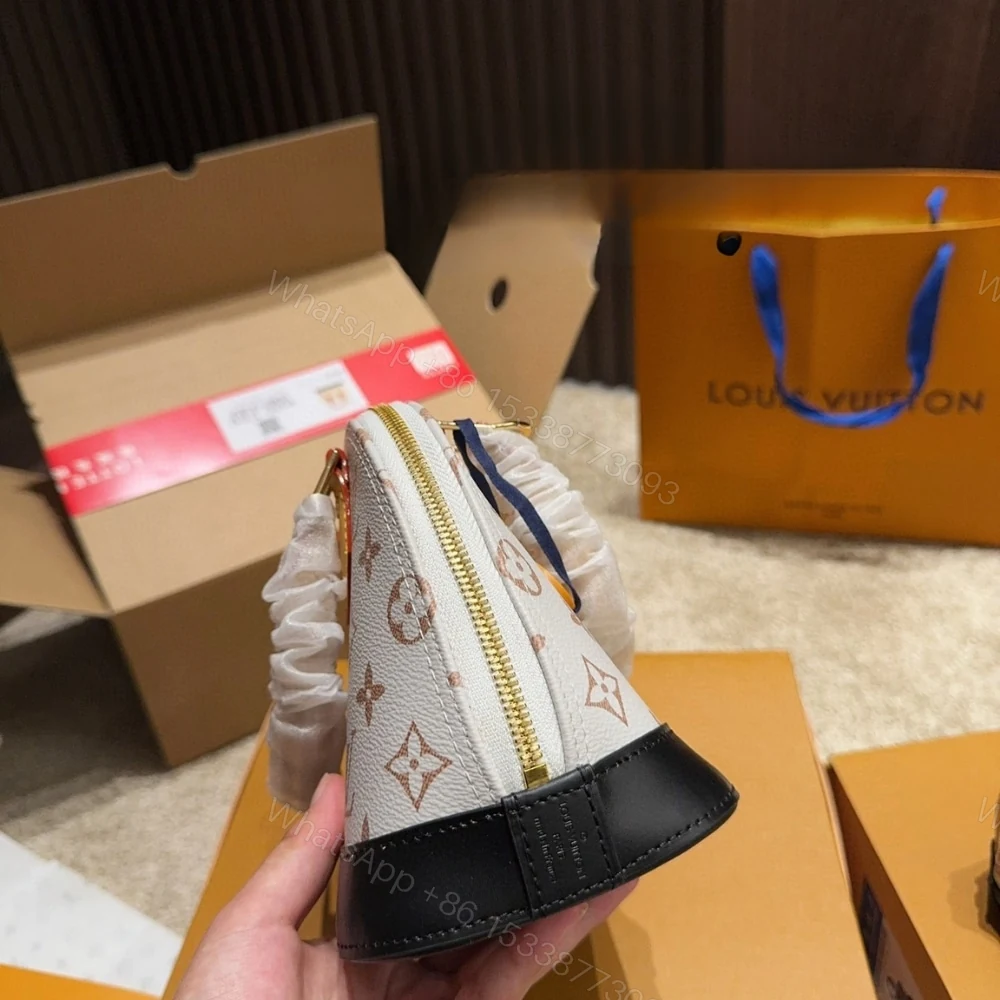 View 3 of Louis Vuitton Nano Alma Other Monogram Canvas Dune 23Cm M46895