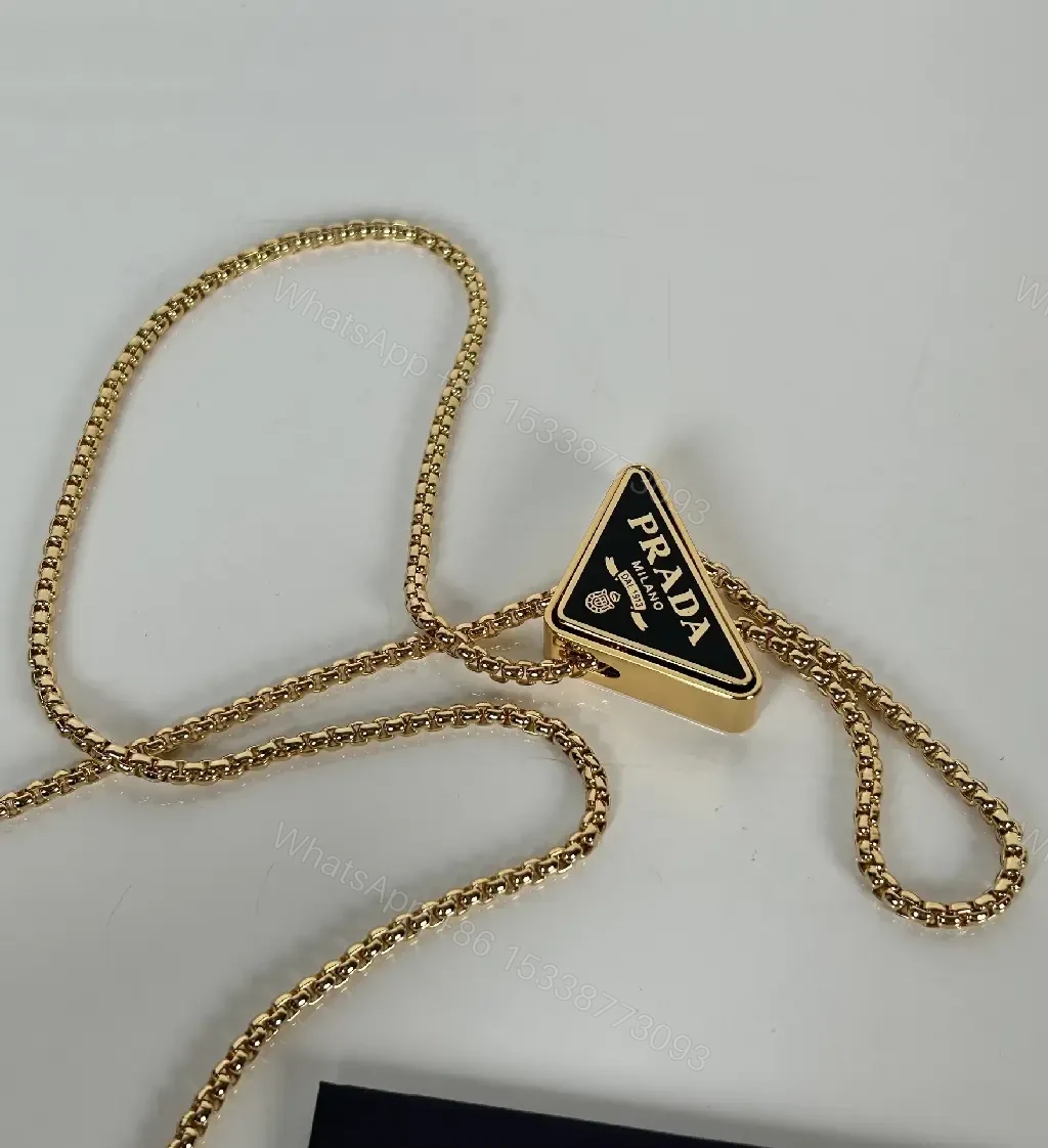 View 5 of Compact Crossbody Bag: Black Leather, Gold Chain, Minimalist Luxe