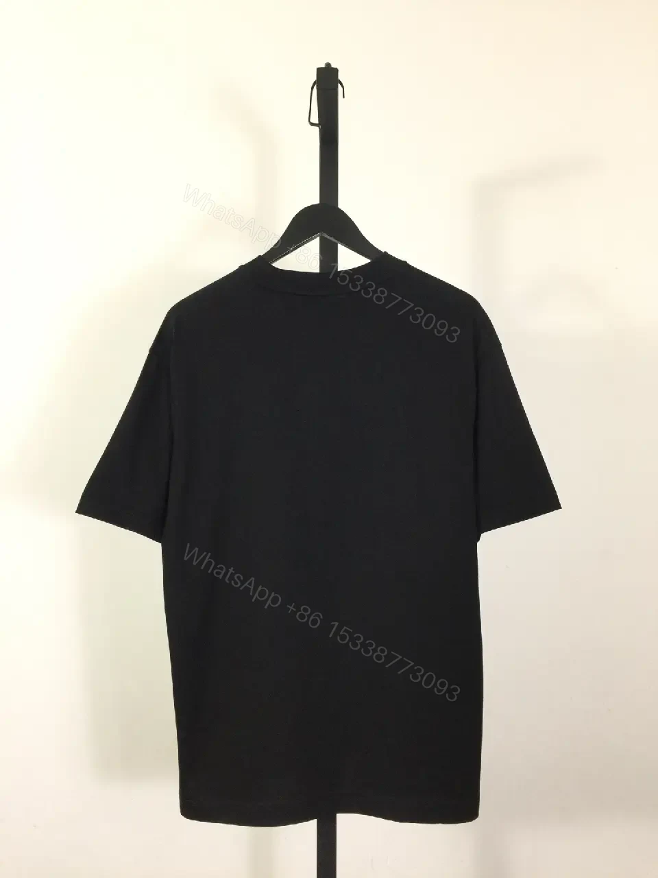 View 6 of Black Cotton Tee | Bold Graphic Logo, Modern Luxe, Casual Suitability
