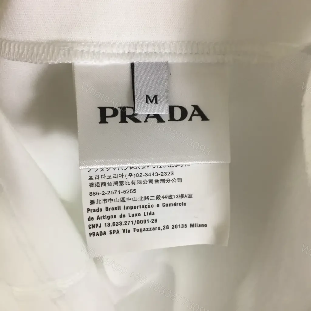 View 6 of White Cotton Zip-Neck Tee with Subtle Logo, Modern Luxe Streetwear