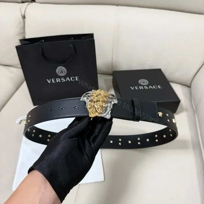 View 4 of Golden Medusa Buckle Belt — Black Leather, Two-Tone Luxury