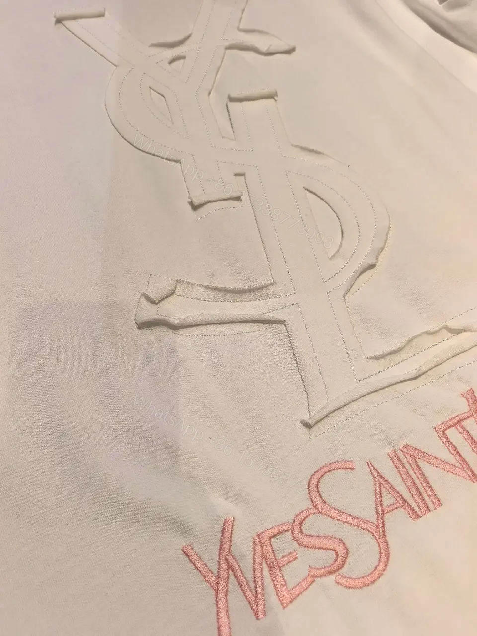 View 4 of Minimalist White Cotton Tee with Subtle Saint Laurent Detail