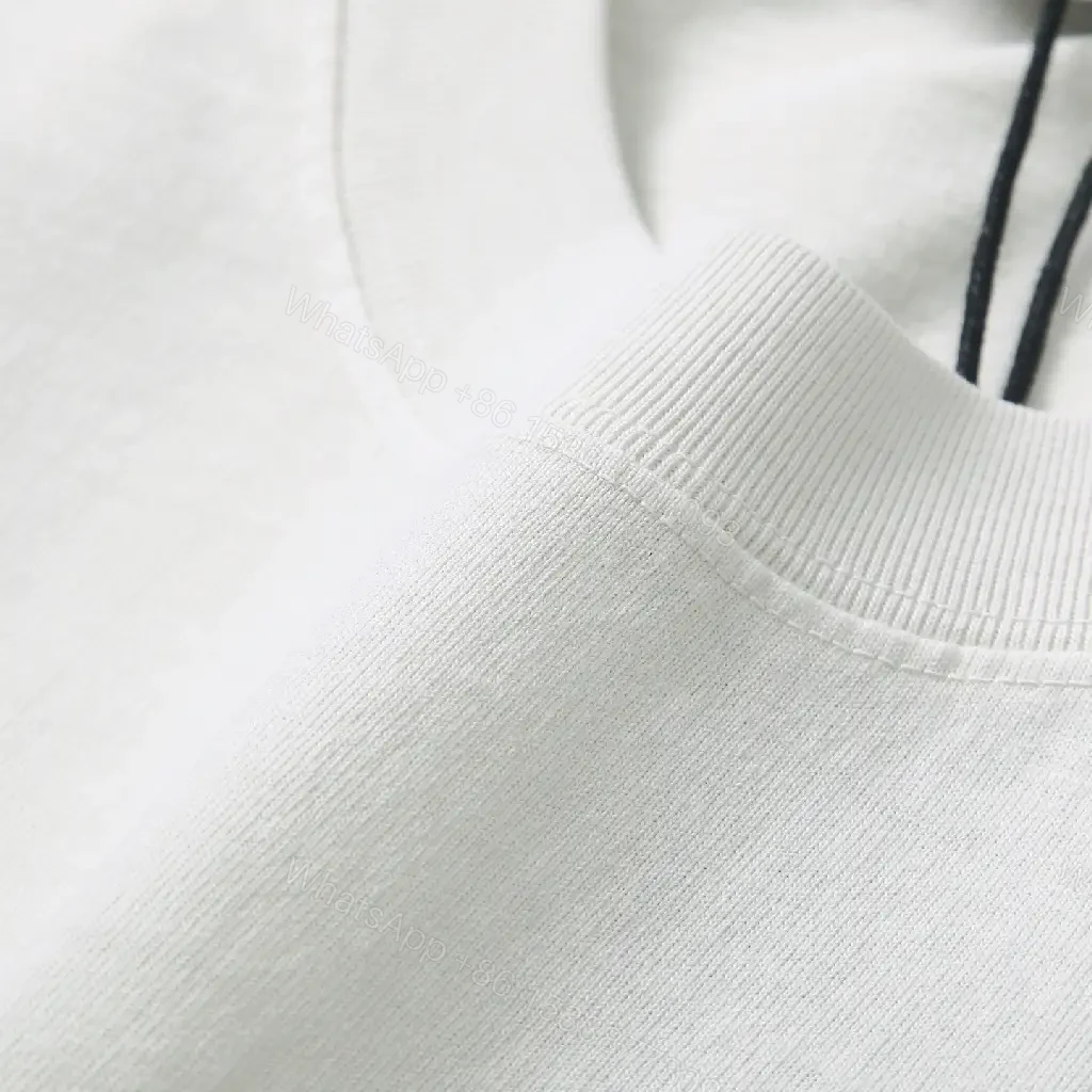 View 5 of Soft Cotton Luxe Logo Tee – Premium Minimalist Style, All-Day Comfort