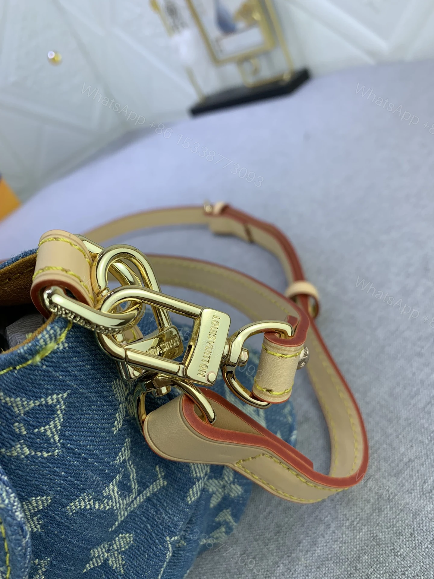View 9 of Louis Vuitton Pleaty bag in blue denim