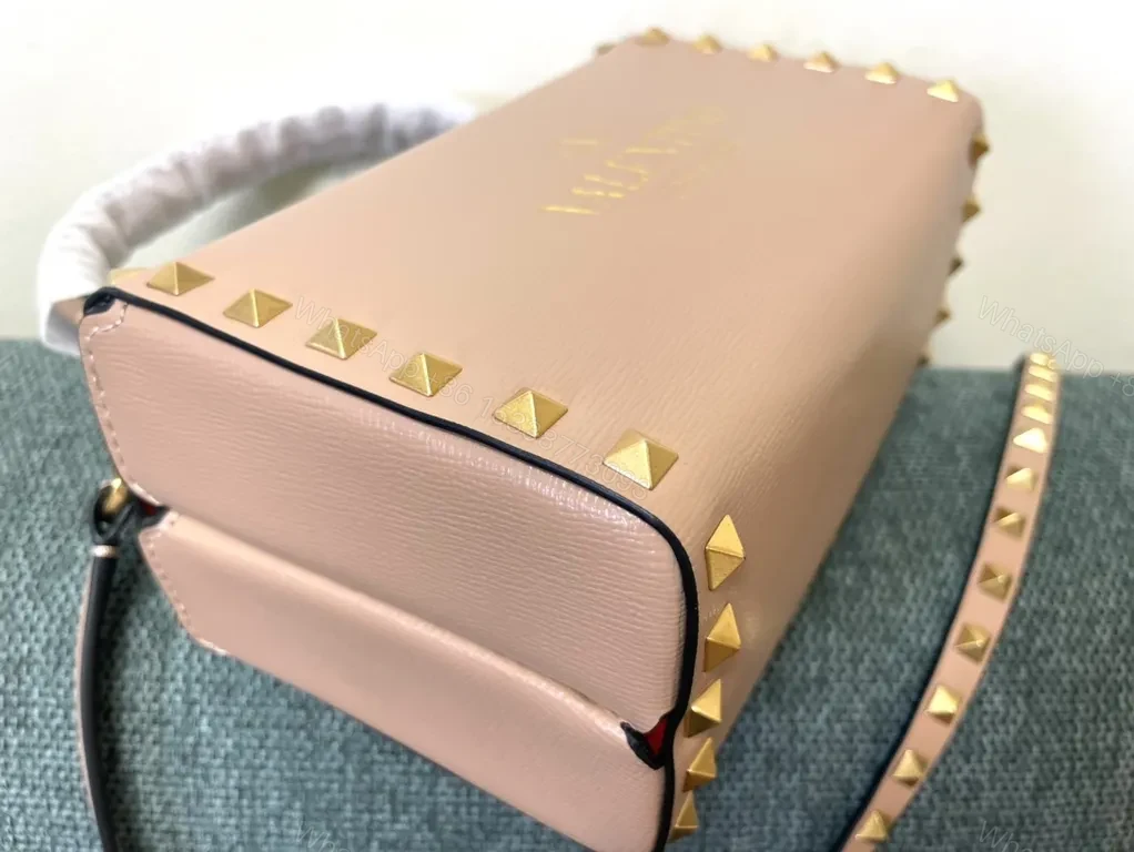 View 7 of Chic Pink Rockstud Mini Bag: Compact Luxury Handbag