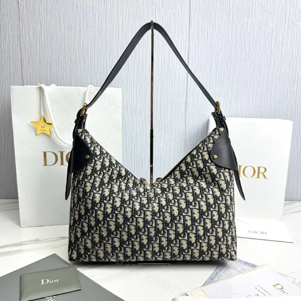 View 3 of Chic Monogram Shoulder Bag: Elegant & Versatile Satchel
