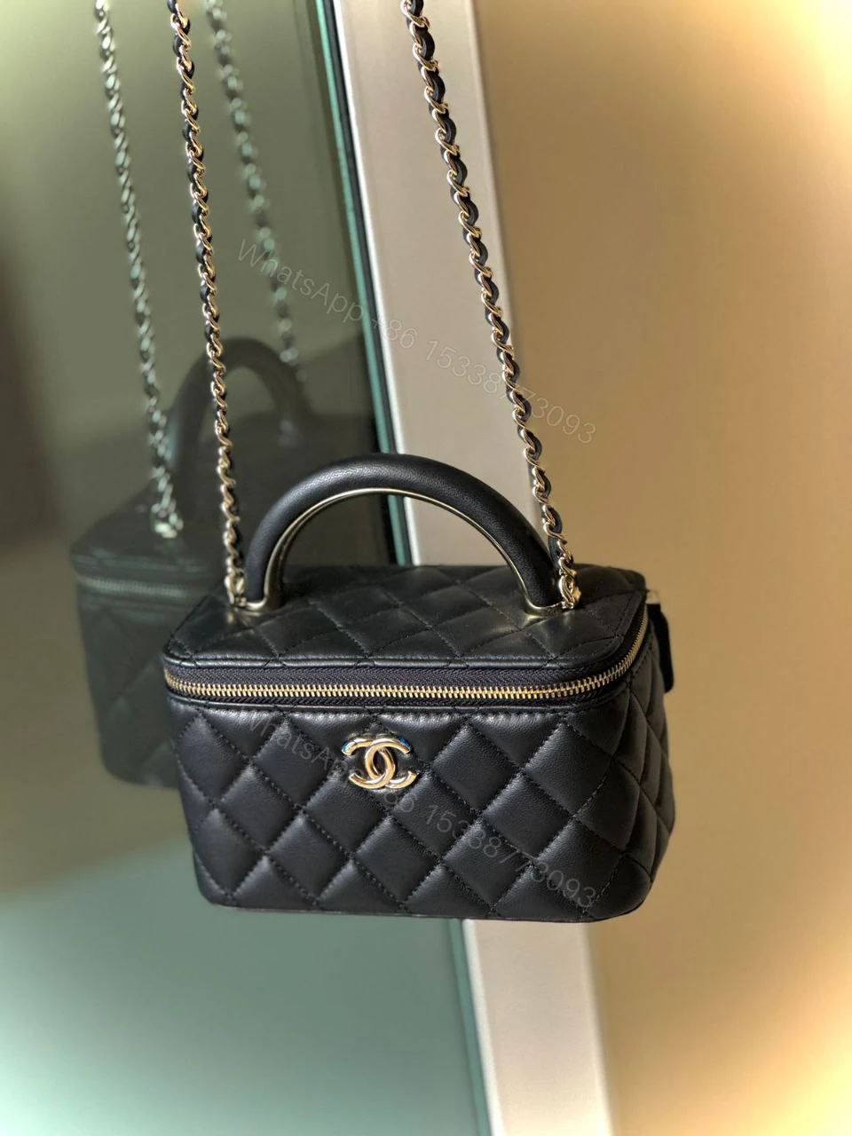 Chanel Lambskin Quilted Small Top Handle Vanity Case With Chain — view 1