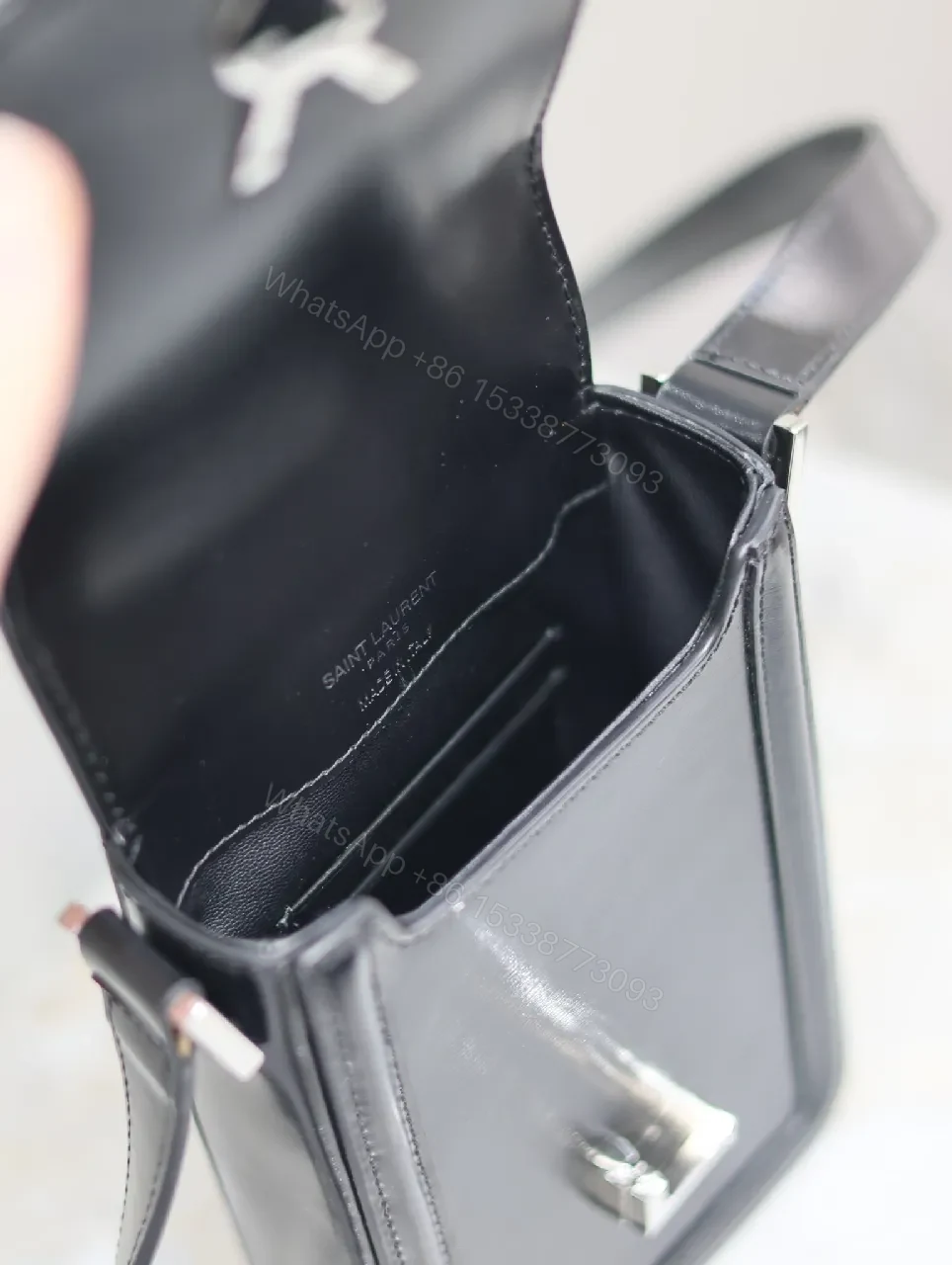 View 7 of Mini Crossbody: Black Leather, Luxe Chic, Logo Clasp, Crossbody Bag