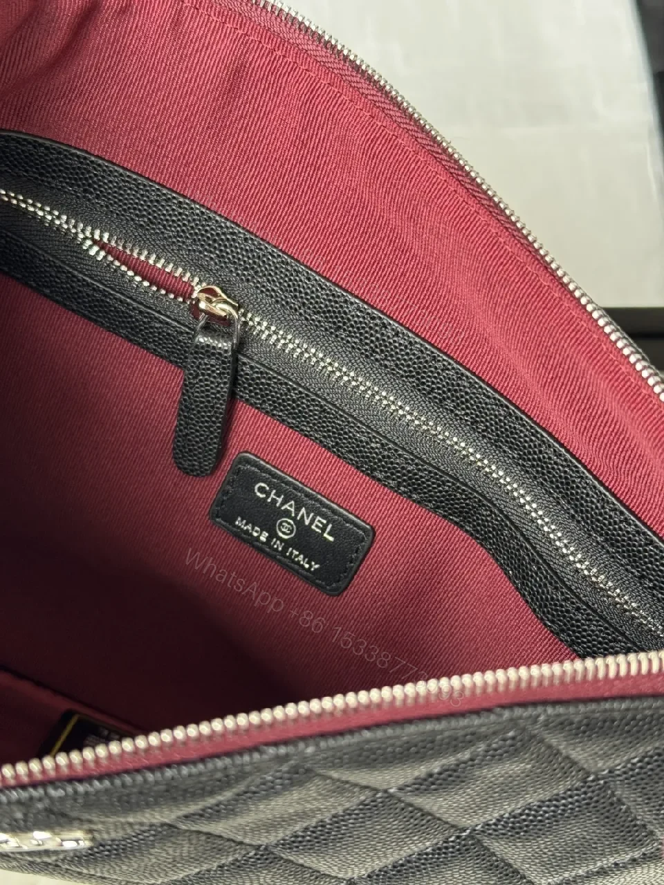 View 9 of Quilted Black Leather Wallet with Red Zip - Minimalist Luxe