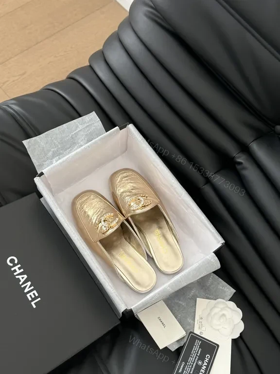 View 4 of Golden Icon Slippers: Luxe Gold Mules with Embossed Texture