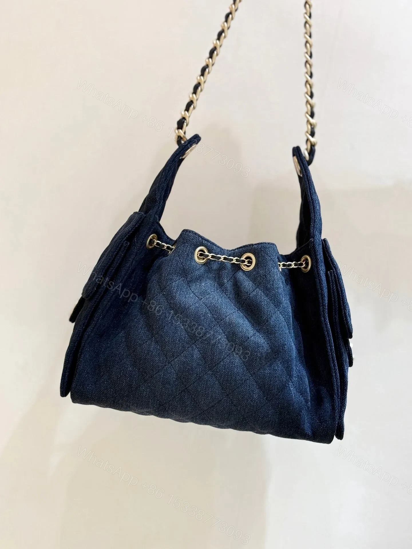 View 4 of CHANEL 25 HANDBAG 30 IN DENIM GOLD HARDWARE