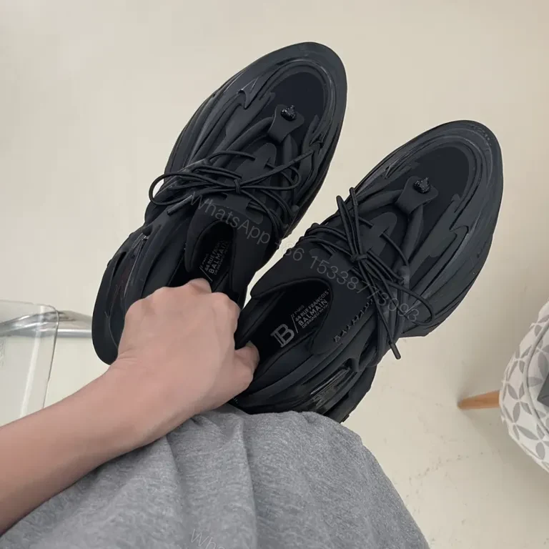 View 5 of Bold Black Balmain High-Top Sneakers: Sculpted Comfort
