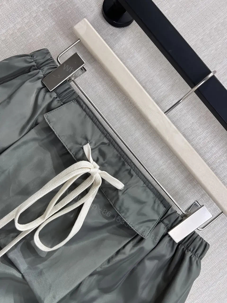 View 11 of Gray Nylon Mini Skirt Drawstring Waist Miu Miu Style Front Patch Pocket Skirt