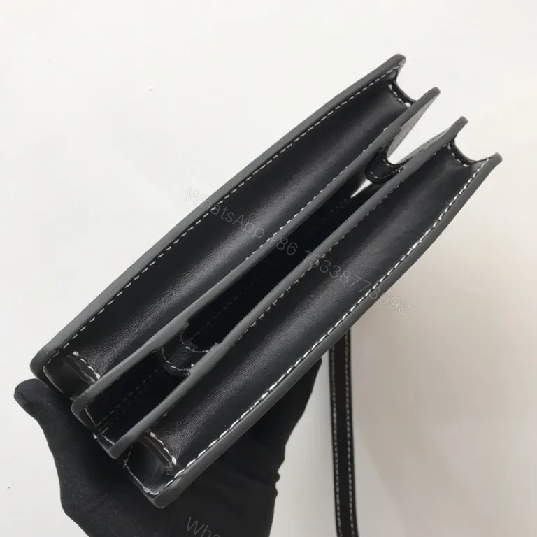 View 8 of Beige Canvas & Black Leather Crossbody: Bold Brand Duo