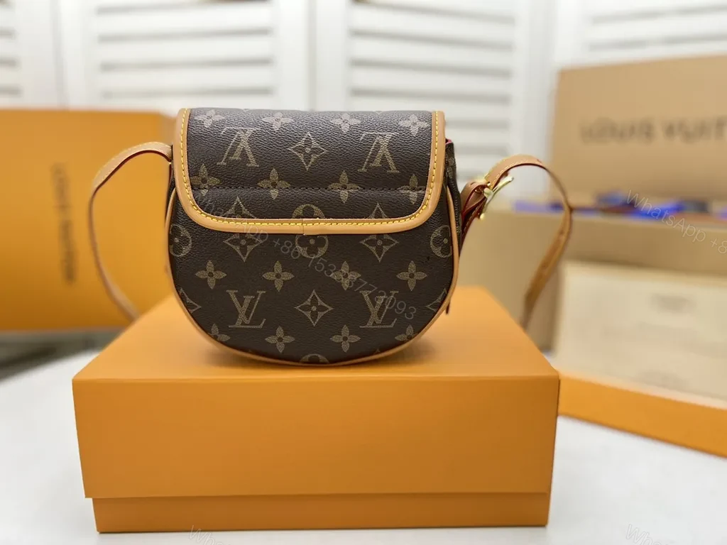 View 5 of Monogram Saddle Bag: Compact Crossbody, All-Day Style