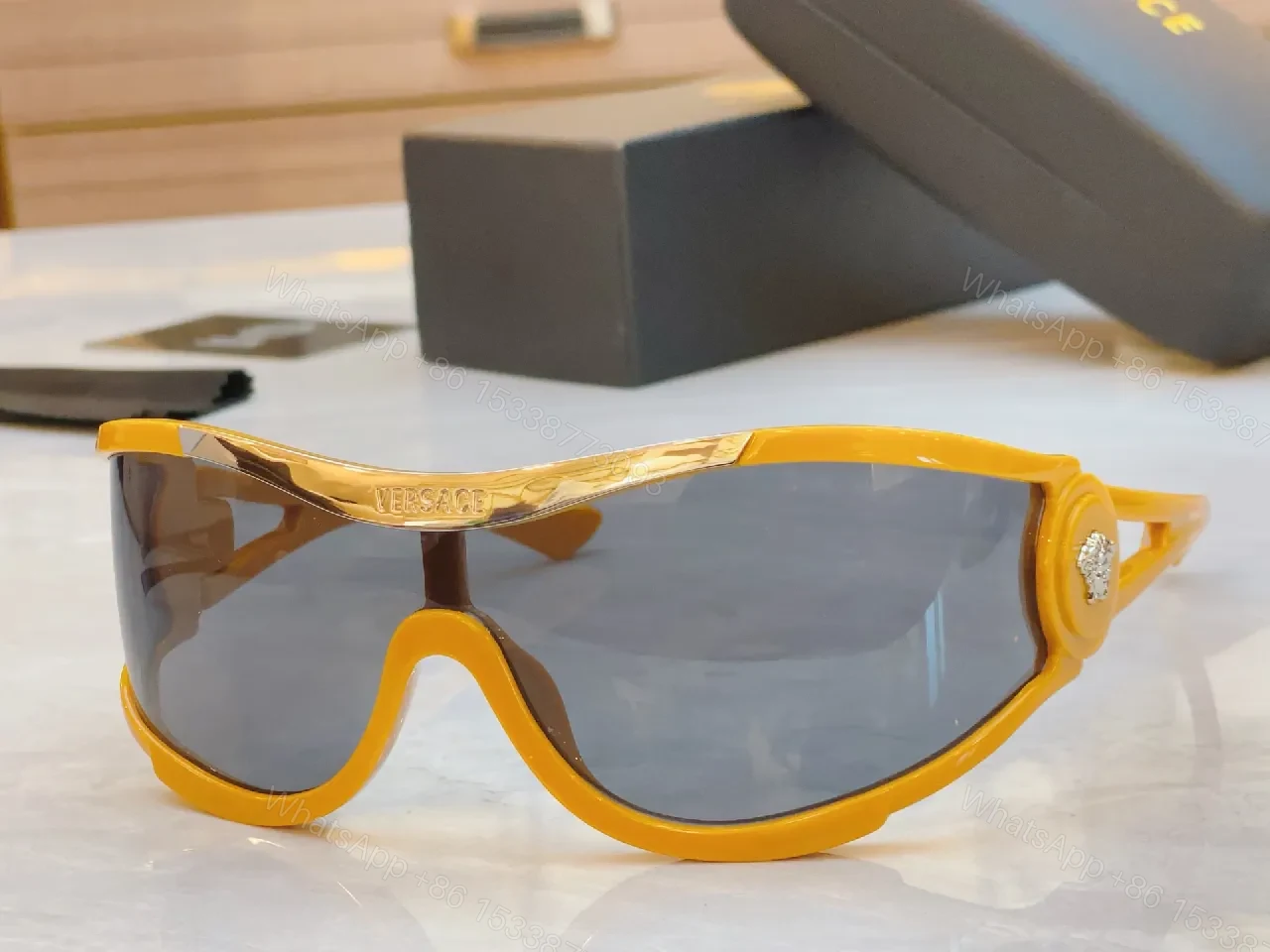 View 9 of Amber Frame Futuristic Sunglasses — Luxury UV Protection, Durable, Comfortable