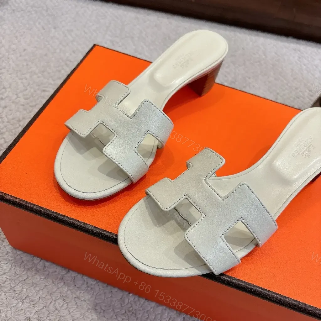 View 7 of Sophisticated Leather Slides: Minimalist, Signature Flair, Comfort