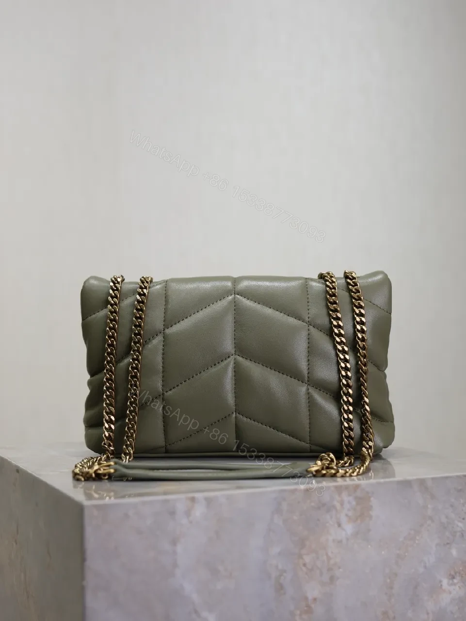 View 9 of Textured Olive Quilted Shoulder Bag with Gold Emblem, Compact Elegant Style