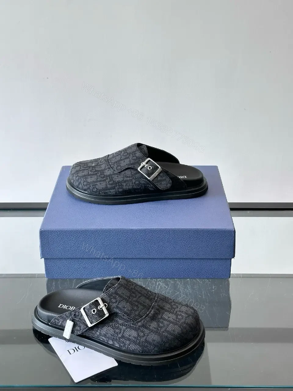 View 3 of Dark Monogram Slip-Ons: Textured Mules with Subtle Buckle